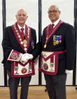 W.Bro George Buckberry, PAGDC, PPSGW, Invicta Award, and W. Bro Hari donatin and presenting the new Worshipful Master's Collar